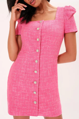 The model is wearing a fuchsia Amelie Tweed Dress by Chloe Colette.