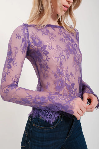 The model is wearing a dark purple Monique Lace Top and Jenny Satin Lavender Mini Skirt by Chloe Colette.