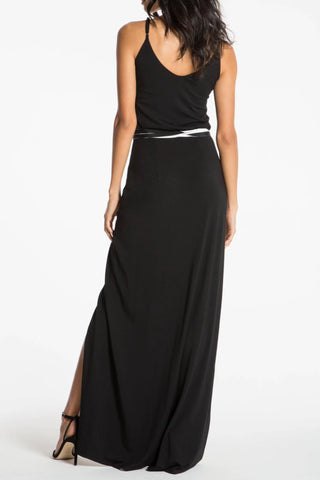 Model is wearing a black Alexa maxi dress by Chloe Colette.
