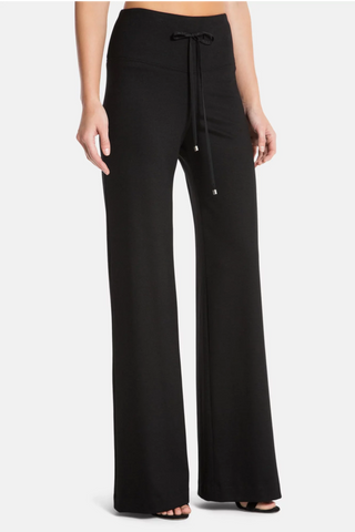 Model is wearing a black wide leg pant Dee Dee by Chloe Colette.