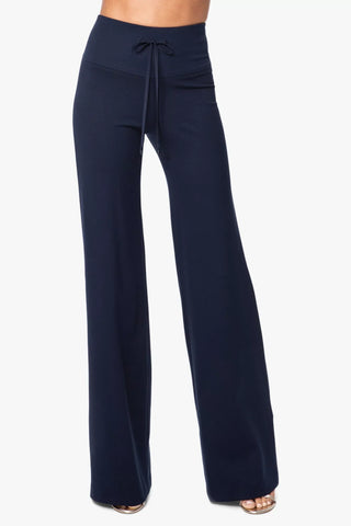 Model is wearing a navy wide leg pant Dee Dee by Chloe Colette - Front View