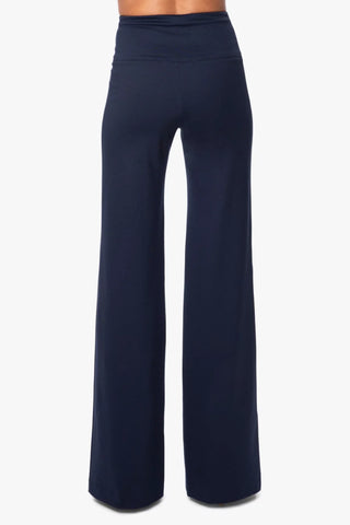 Model is wearing a navy wide leg pant Dee Dee by Chloe Colette - Back View