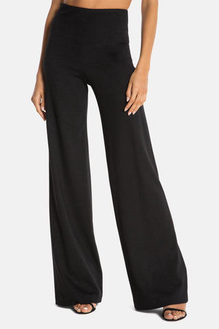 Model wearing a black of navy Francesca wide leg pants by Chloe Colette.