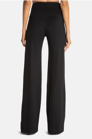 Model wearing a black of navy Francesca wide leg pants by Chloe Colette.
