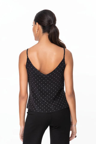 Model wearing a pindot silk strappy cami v-neck Jennifer by Chloe Colette.