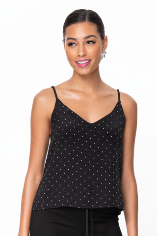 Model wearing a pindot silk strappy cami v-neck Jennifer by Chloe Colette.