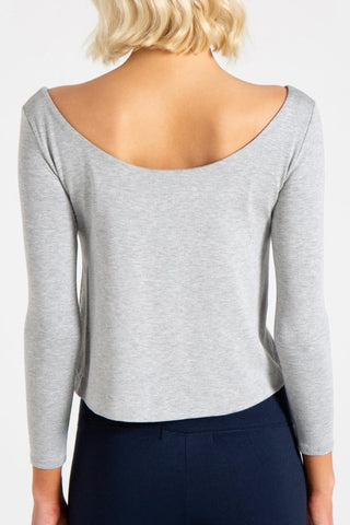 Model is wearing a heather grey Lexi boat neck tee by Chloe Colette.
