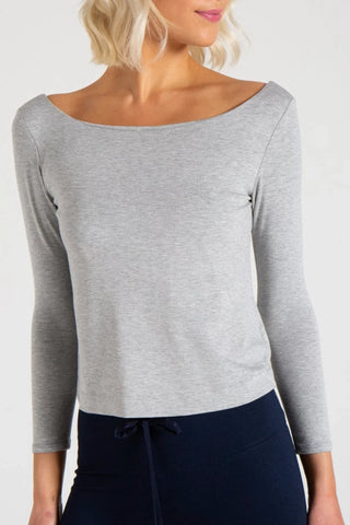 Model is wearing a heather grey Lexi boat neck tee by Chloe Colette.