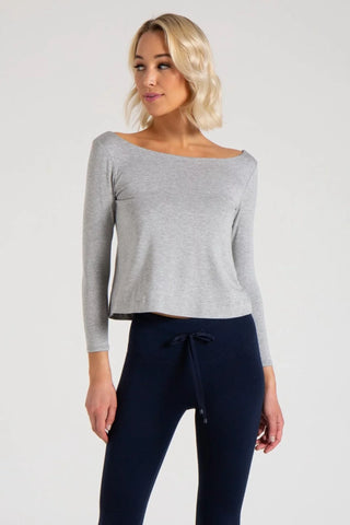 Model is wearing a heather grey Lexi boat neck tee by Chloe Colette.