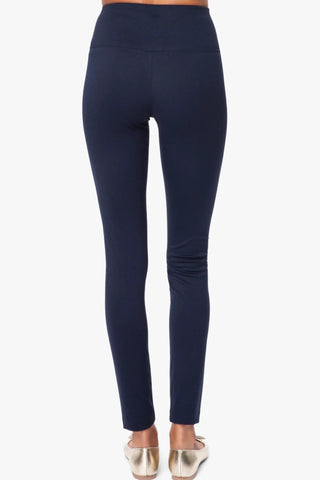 Model is wearing a navy London long leggings by Chloe Colette.