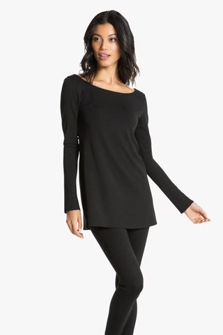Model is wearing a black Marina boat neck tunic by Chloe Colette.