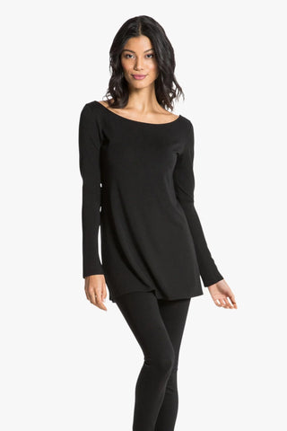 Model is wearing a black Marina boat neck tunic by Chloe Colette.