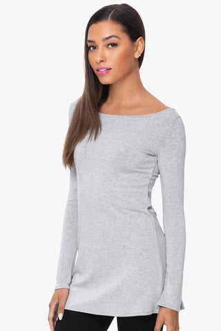 Model is wearing a heather grey Marina boat neck tunic by Chloe Colette.