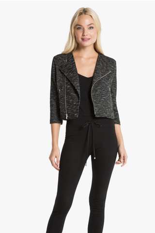 Model is wearing a black and white moto jacket Morgan by Chloe Colette.