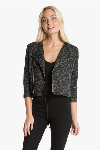 Model is wearing a black and white moto jacket Morgan by Chloe Colette.