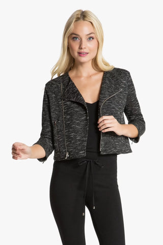 Model is wearing a black and white moto jacket Morgan by Chloe Colette.