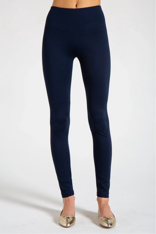Model is wearing a navy New York long leggings by Chloe Colette.
