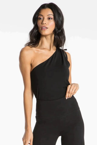 Model is wearing a black Julie on shoulder top by Chloe Colette.