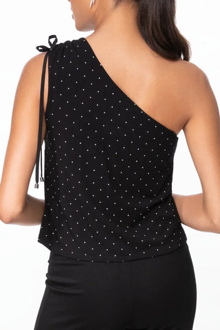Model is wearing a pindot Julie on shoulder top by Chloe Colette.