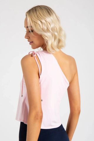 Model is wearing a pindot Julie on shoulder top by Chloe Colette.
