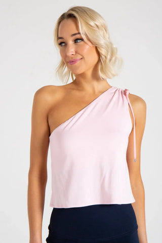 Model is wearing a pindot Julie on shoulder top by Chloe Colette.
