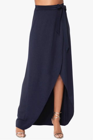 Model wearing a Navy maxi skirt St Tropez by Chloe Colette