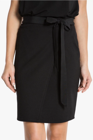Model is wearing a black Stevie women's skirt by Chloe Colette.