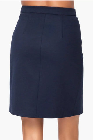 Model is wearing a navy Stevie women skirt by Chloe Colette.