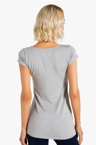 Model is wearing a heather grey short sleeve tunic Virginia by Chloe Colette.