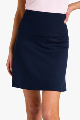 Variant Collection for Maxine women's skirt. Model is wearing a navy maxine women's skirt.