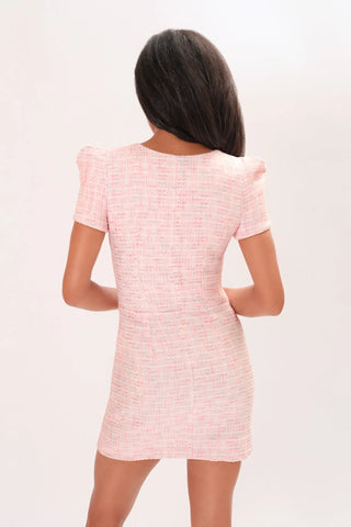 Back side of model wearing a pink rose Amelie Tweed Dress by Chloe Colette