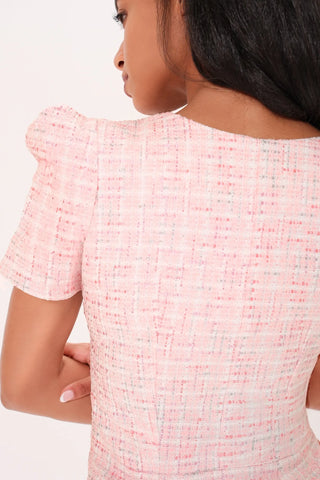 Back side close up of model wearing a pink dress Amelie Tweed Dress by Chloe Colette.