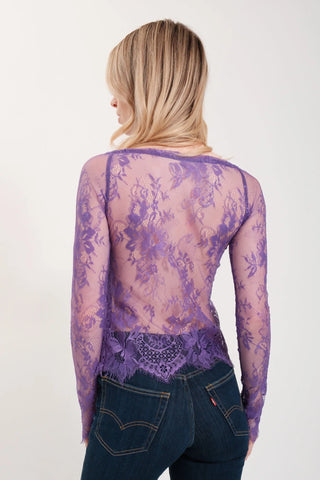 The model is wearing a dark purple Monique Lace Top and Jenny Satin Lavender Mini Skirt by Chloe Colette.