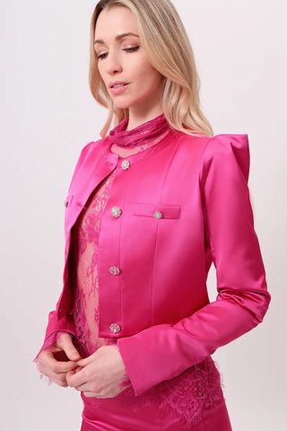 The model is wearing a satin rosolite juliette jacket by chloe colette