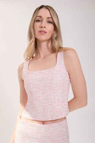 The model is wearing a pink rose Tweed Square Neck Tank by Chloe Colette.