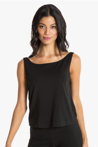 Model is wearing a black boat neck tank top Cecilia by Chloe Colette