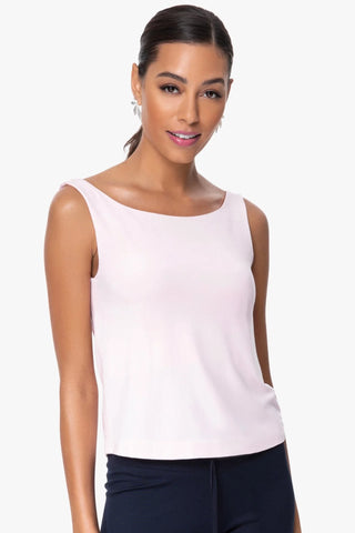 Model is wearing a ballet pink boat neck tank top Cecilia by Chloe Colette