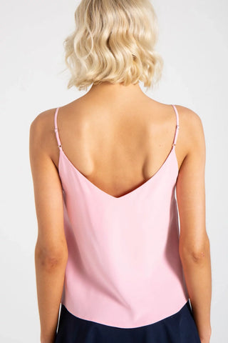Model wearing a ballet pink silk strappy cami v-neck Jennifer by Chloe Colette.