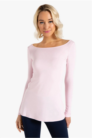 Model is wearing ballet pink Marina boat neck tunic by Chloe Colette.