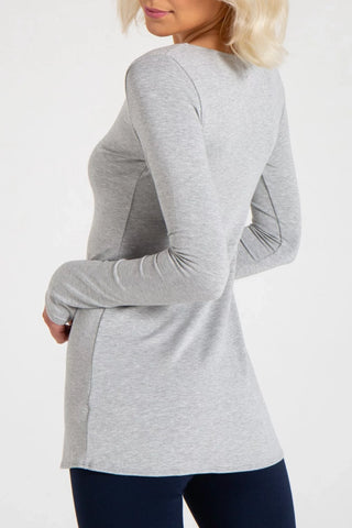 Model is wearing a heather grey Sonja long sleeve tunic tee by Chloe Colette.