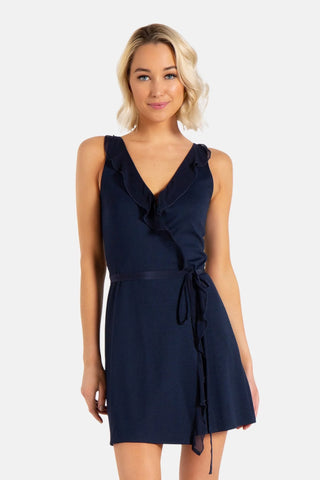 Model is wearing a navy Bliss wrap mini dress by Chloe Colette.